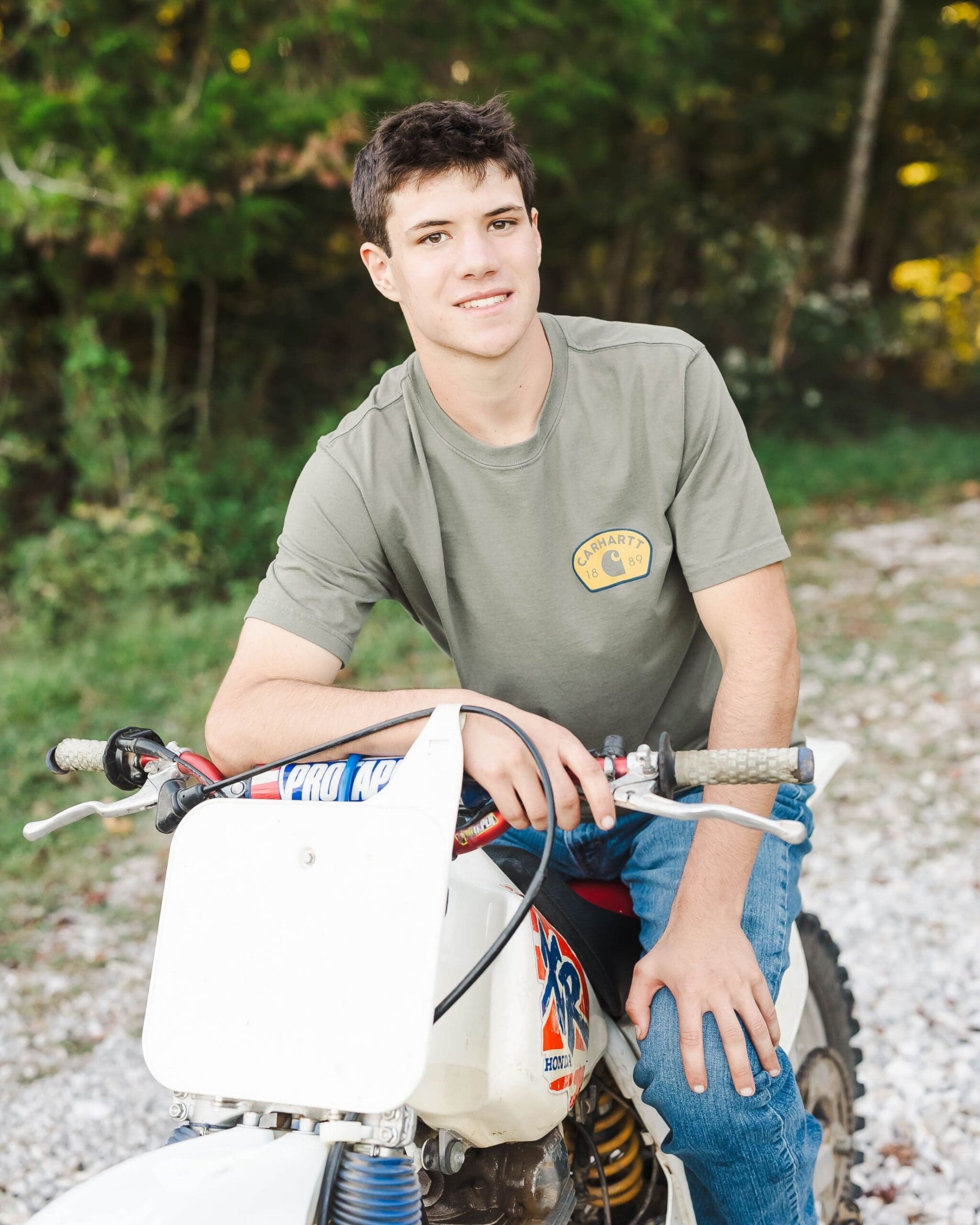 Bowling Green KY senior portraits of a high school senior riding his dirt bike , shot by Jordan Z Photography