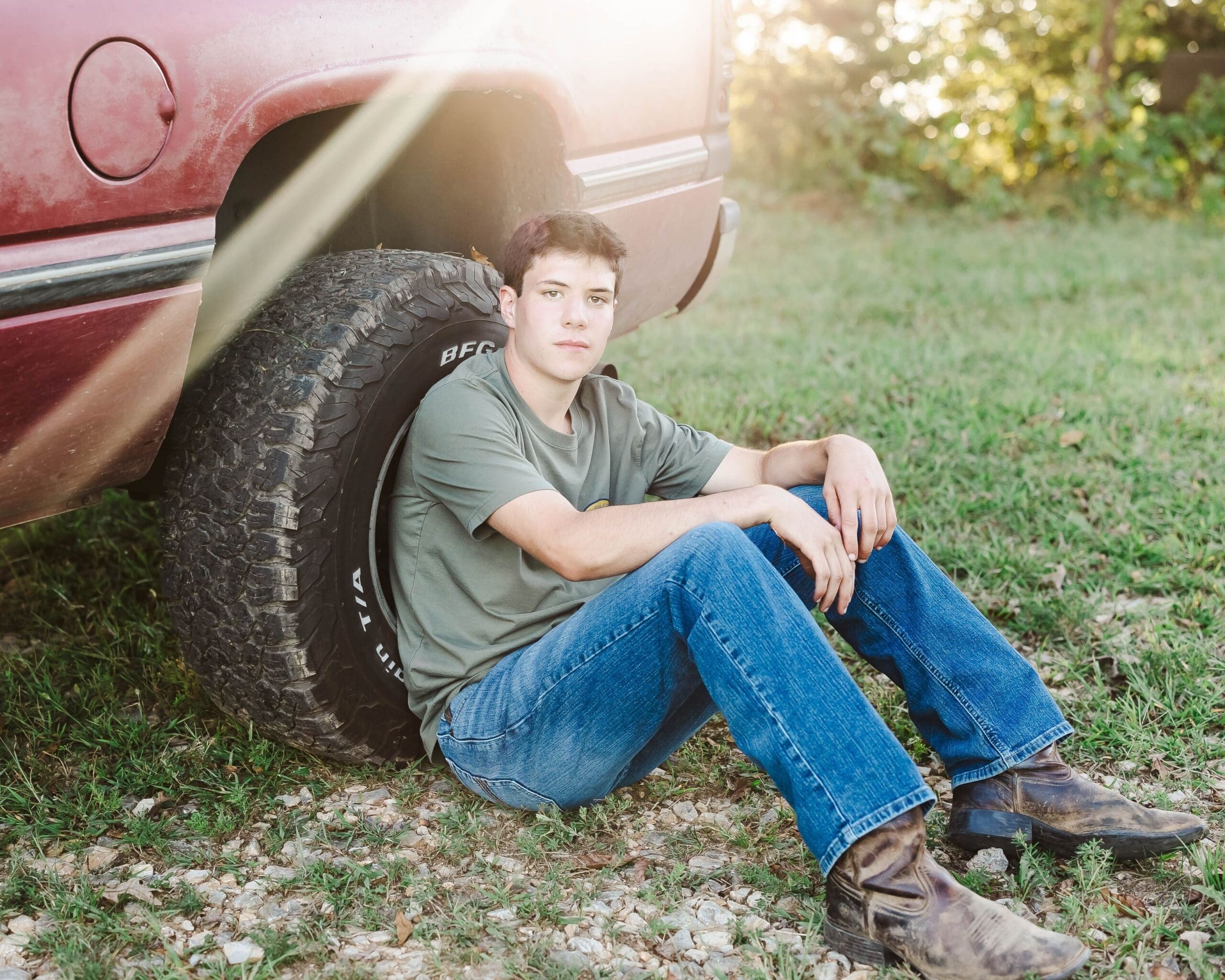 Senior guy portrait session in Bowling Green KY featuring his dads old truck and rustic countryside setting, shot by Jordan Z Photography