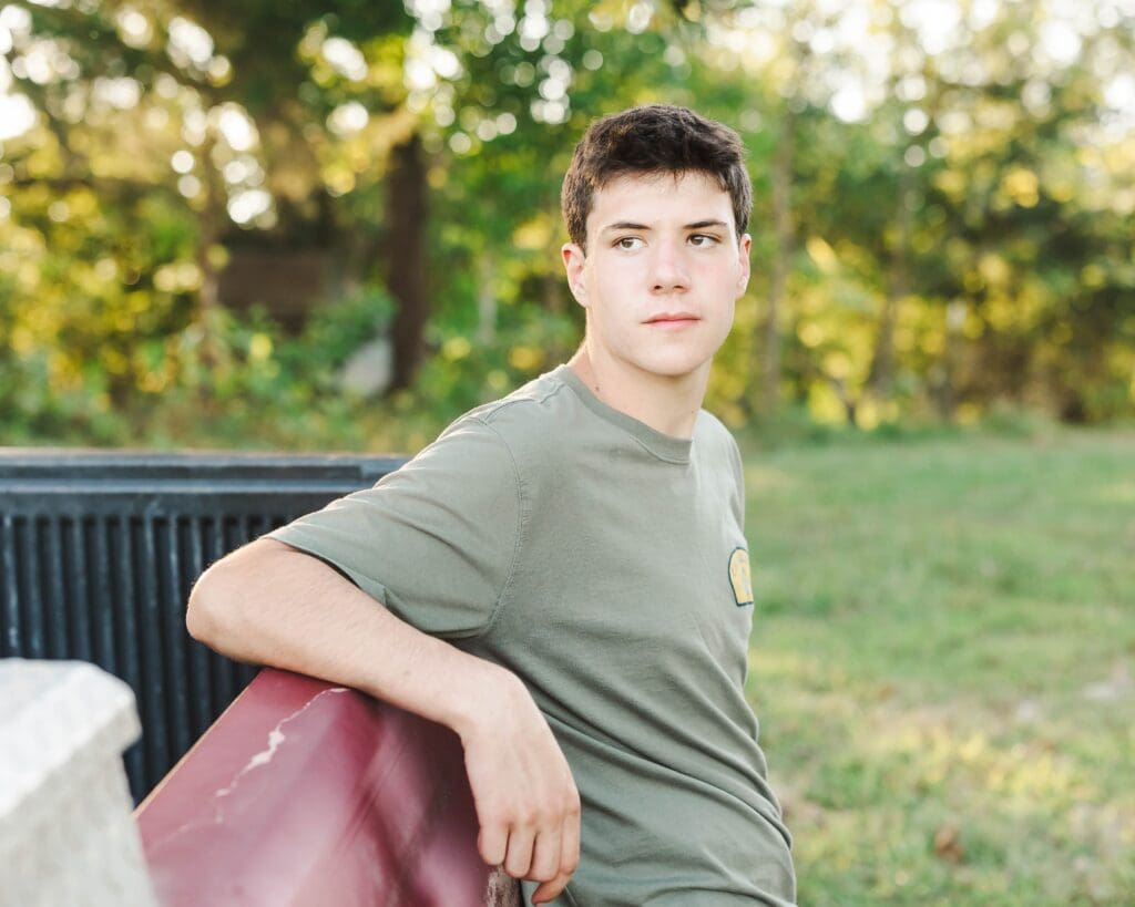 High school senior portraits captured on family property in Bowling Green, Kentucky at sunset.