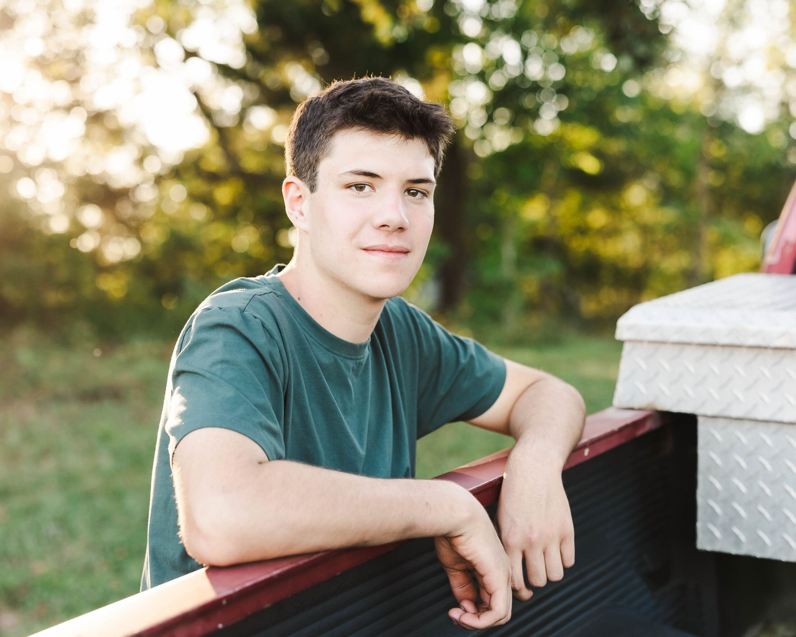Senior guy portrait session in Bowling Green KY rustic countryside setting using his truck as his prop, shot by Jordan Z Photography