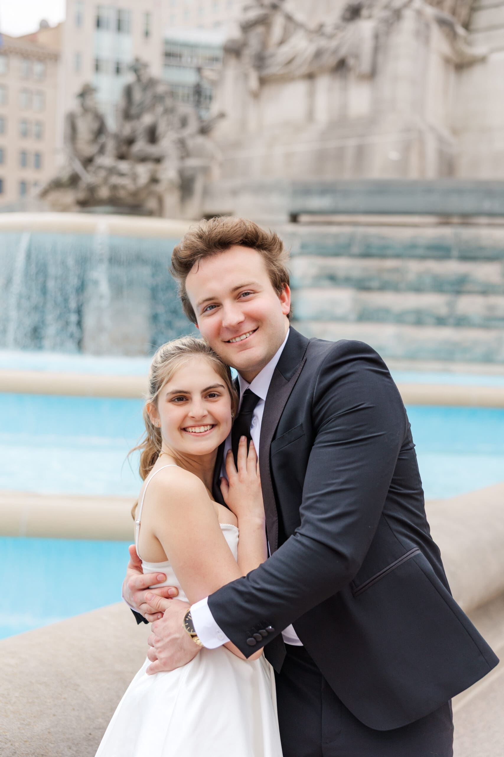 Natalie and Nathan standing in front of the Soldiers and Sailors Monument in Indianapolis, shot by Jordan Z Photography