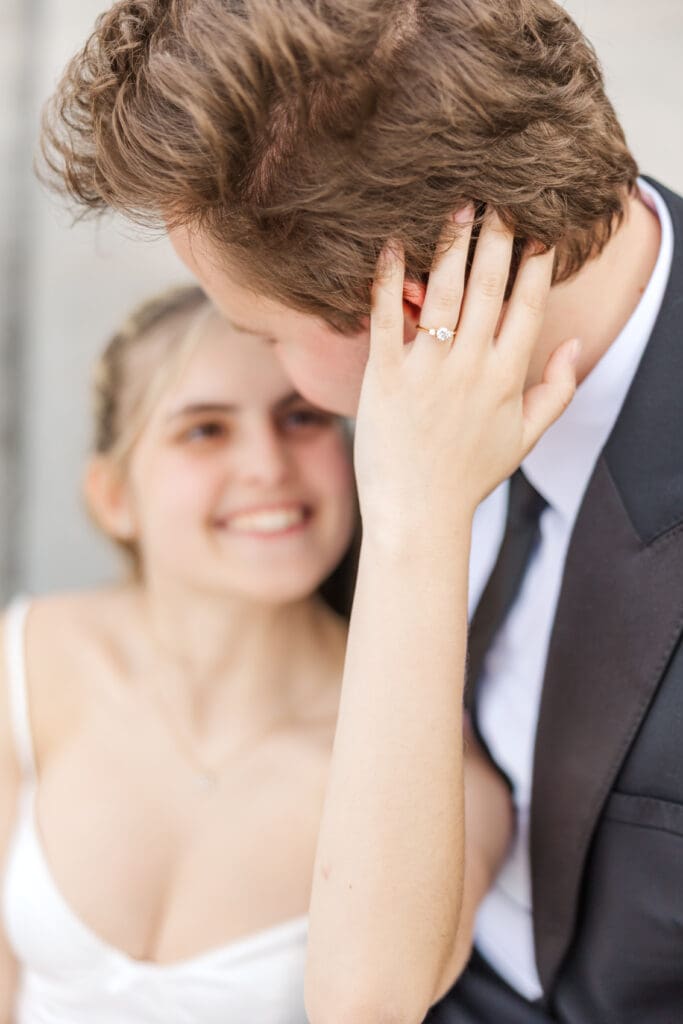 Natalie and Nathan embracing on the steps of the Indiana War Memorial in downtown Indianapolis, shot by Jordan Z Photography